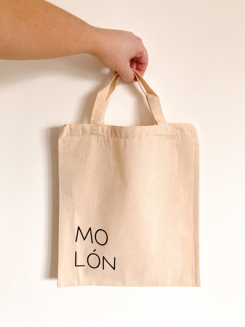 A midi neutral tote with the words Mo Lón my lunch in gaeilge Irish wrote on it